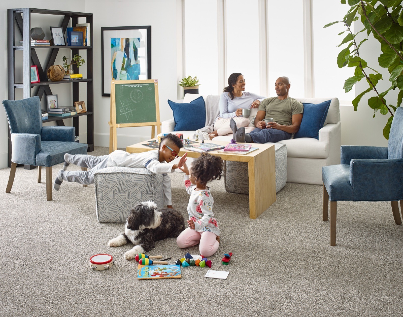 Family enjoying on grey carpet | O'Krent Floors