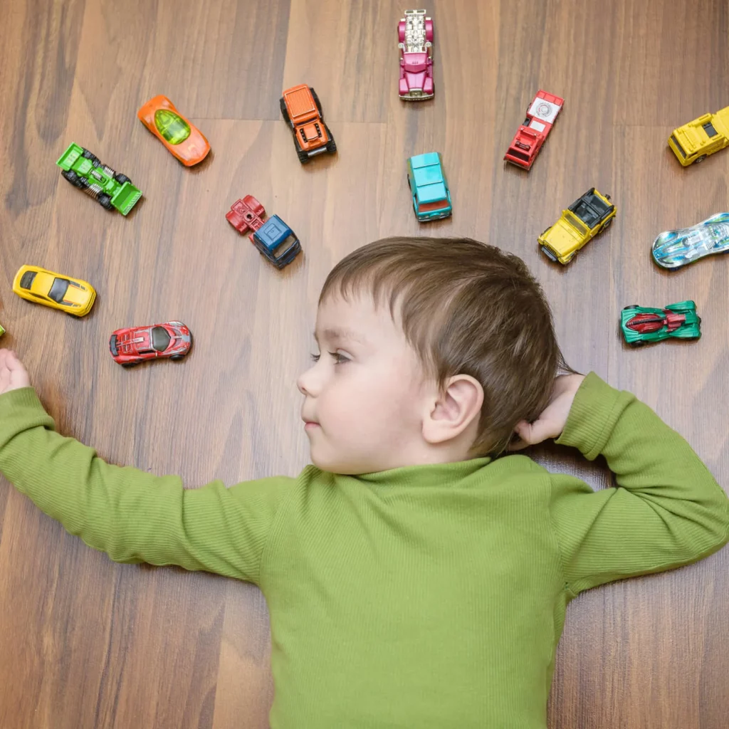 Kid with toys | O'Krent Floors